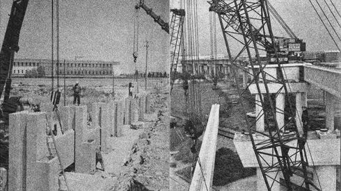 Cantiere con pilastri prefabbricati e gru